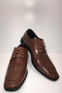 Pair of brown leather dress shoes.