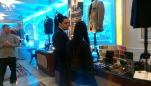 Men's formal wear display at event.