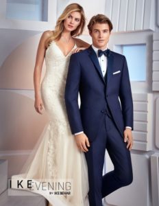 Elegant bride and groom in formal wear.