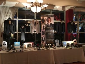 Tuxedo display with menswear brands.