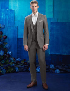 Man in gray suit and bow tie.