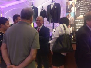 Men's formal wear display at store.