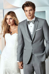 Grey tuxedo and wedding dress.