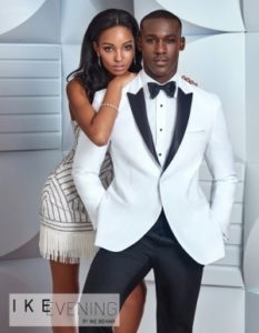 Couple in white tuxedo and beaded dress.