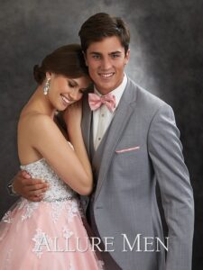 Couple in prom attire: Allure Men.