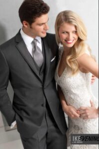 Groom and bride in formal wear.