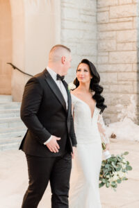 Bride and groom walking, wedding day.