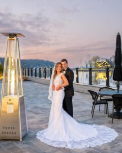 Bride and groom wedding portrait outdoors.